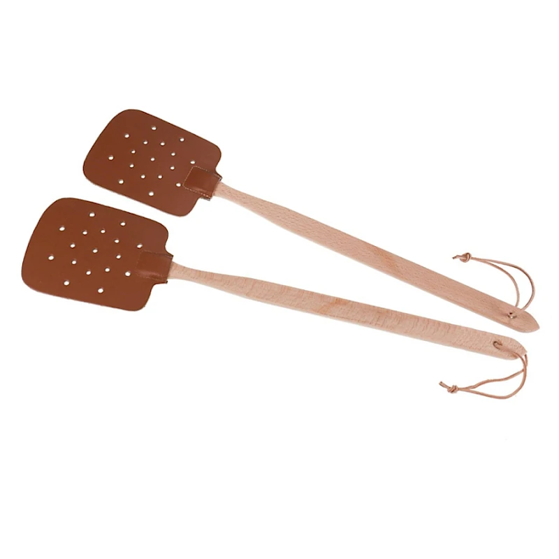 Nahkainen Kärpäslätkä logolla retro kärpäslätkä nahkaa puuta